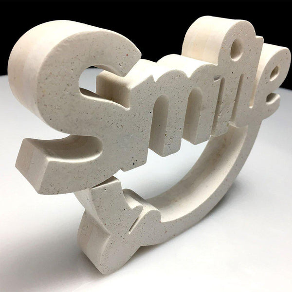 Escultura Smile Hueso - Camaleon-art - concrete shop art