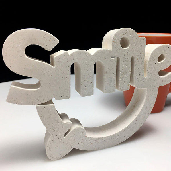 Escultura Smile Hueso - Camaleon-art - concrete shop art