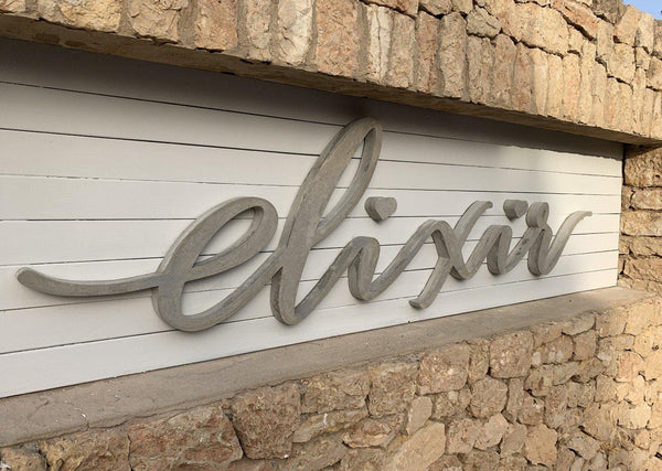 Rotulación letras en cemento sobre fachada - Camaleon-art - concrete shop art