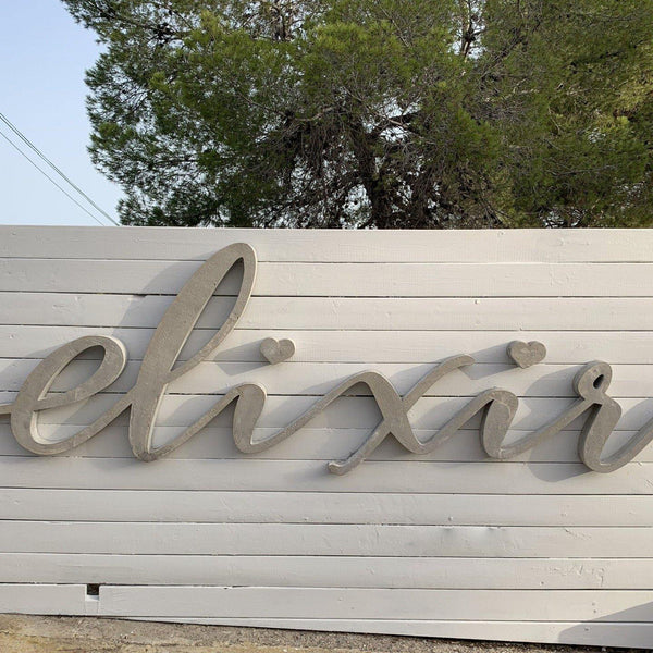 Rotulación letras en cemento sobre fachada - Camaleon-art - concrete shop art