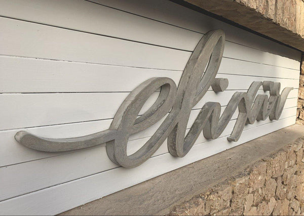 Rotulación letras en cemento sobre fachada - Camaleon-art - concrete shop art