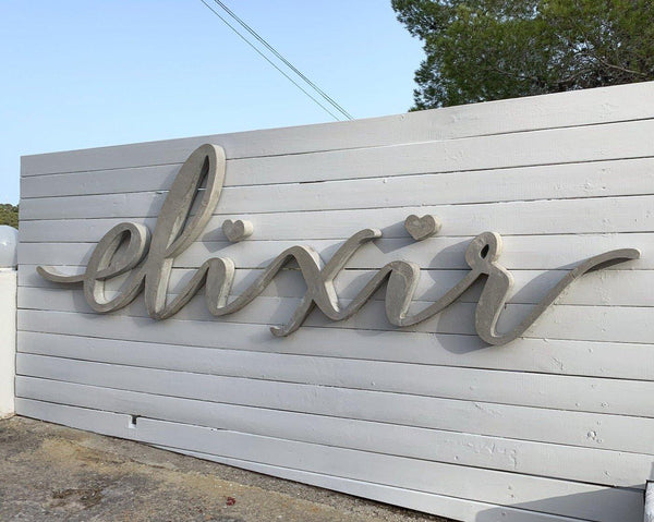 Rotulación letras en cemento sobre fachada - Camaleon-art - concrete shop art