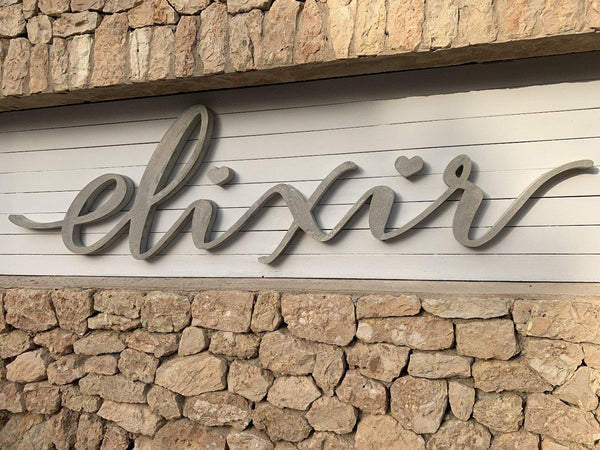 Rotulación letras en cemento sobre fachada - Camaleon-art - concrete shop art