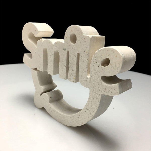 Escultura Smile Hueso - Camaleon-art - concrete shop art