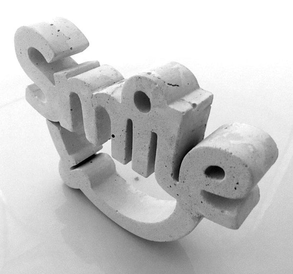 Escultura Smile Hueso - Camaleon-art - concrete shop art